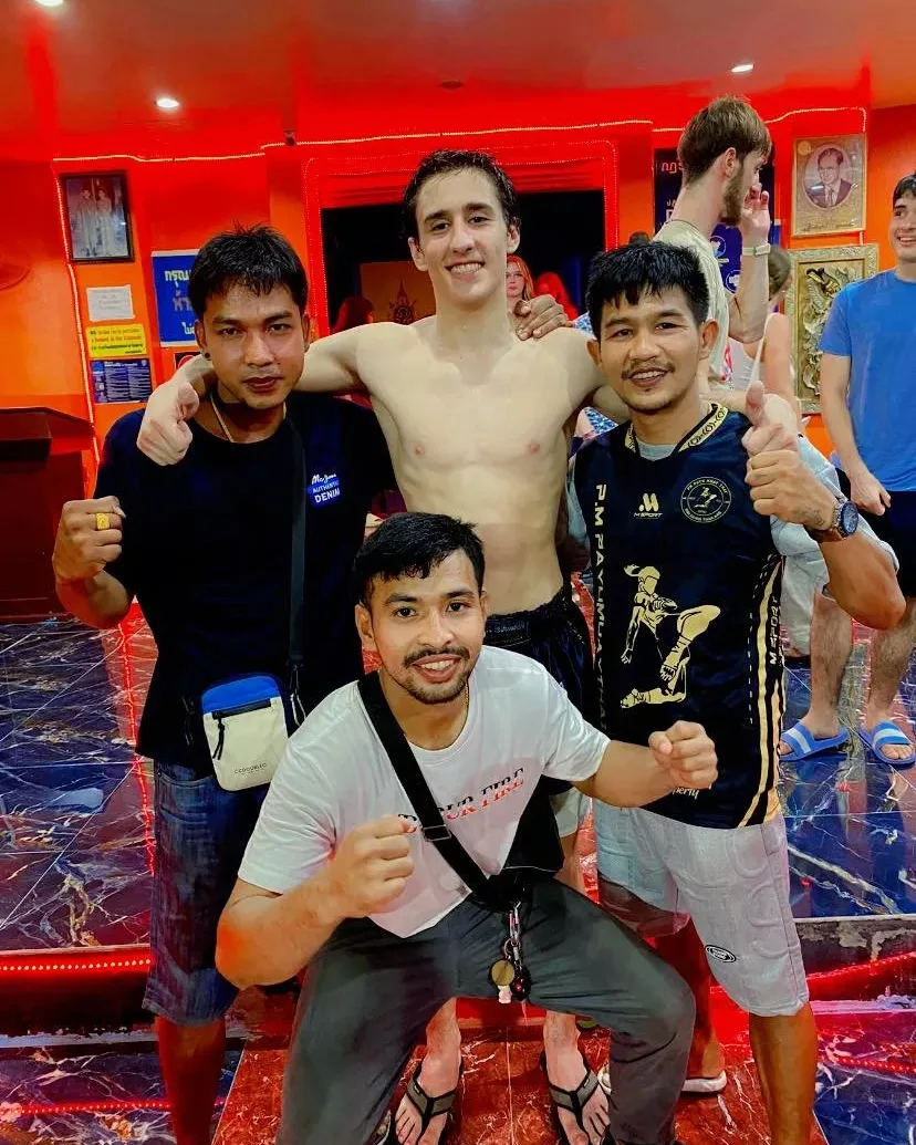 Post-fight team photo at Samui International Stadium