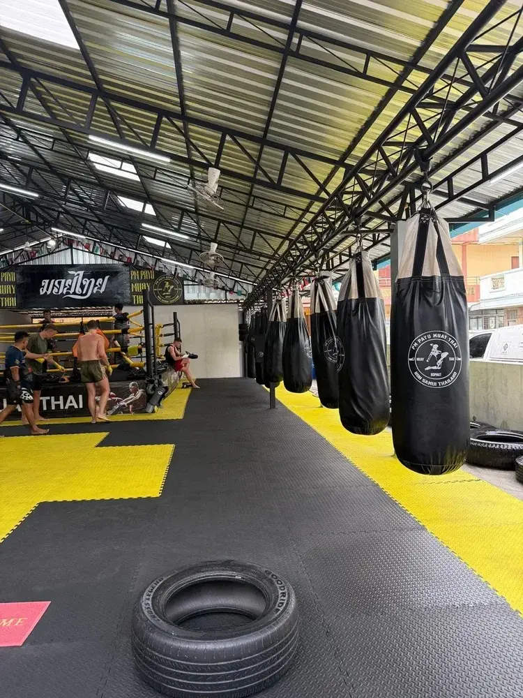 Bag line and training space at PM PAYU Muay Thai, Koh Samui