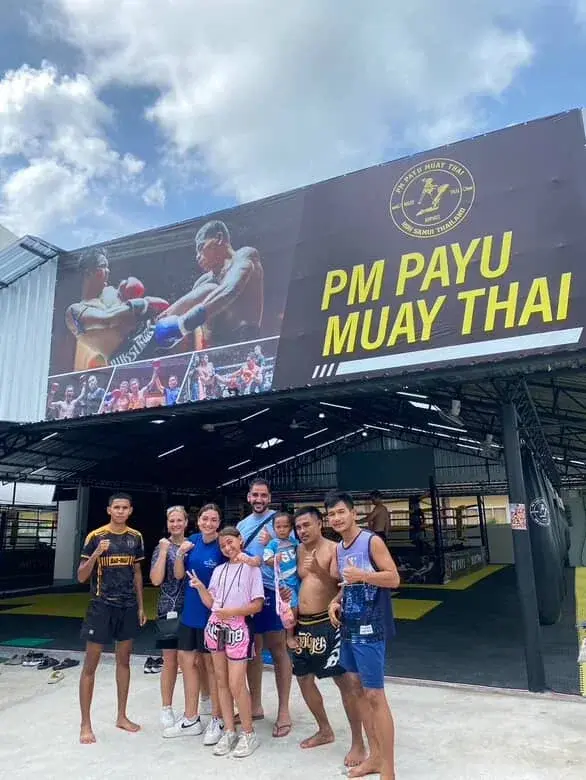 Students outside PM PAYU Muay Thai gym entrance, Koh Samui