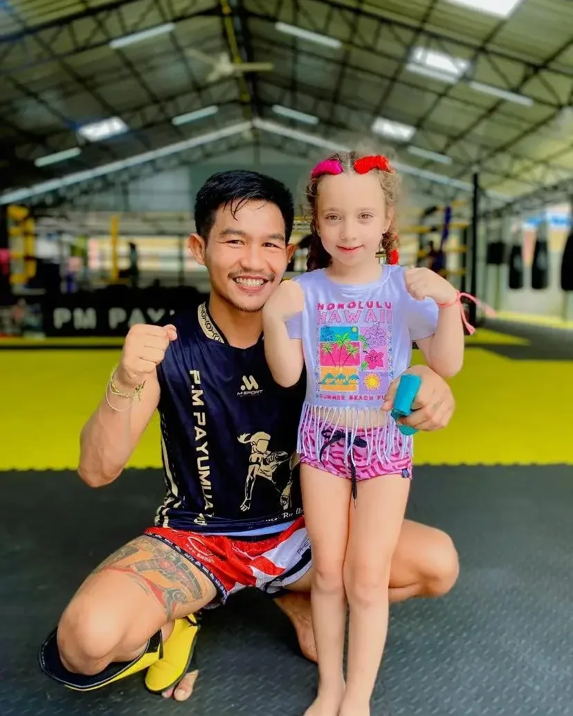 Teen student posing in the ring after class at PM PAYU, Koh Samui