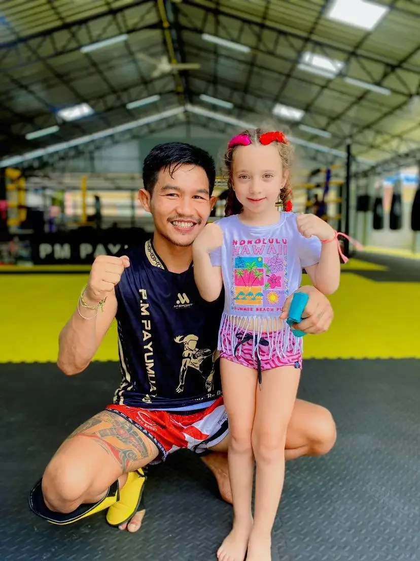 Teen student posing in the ring after class at PM PAYU, Koh Samui